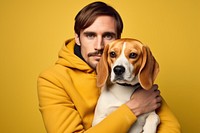 American man hugging beagle pet portrait animal. AI generated Image by rawpixel.