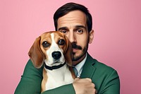 Middle east man hugging beagle pet portrait animal. AI generated Image by rawpixel.
