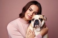 Middle east woman hugging bulldog pet portrait animal. AI generated Image by rawpixel.