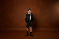 Kid in school uniform footwear standing accessories. AI generated Image by rawpixel.