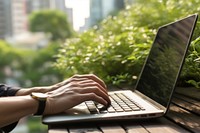 Hands typing on a laptop keyboard computer outdoors adult. AI generated Image by rawpixel.