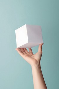 Gift box holding white paper. AI generated Image by rawpixel.