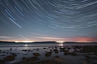 Night sky nature beach landscape. AI generated Image by rawpixel.