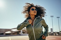 Female wearing cool fashion bold sunglasses running jacket. AI generated Image by rawpixel.