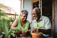 African senior couple having fun gardening outdoors adult plant. AI generated Image by rawpixel.