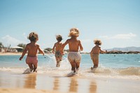 Children playing on the beach vacation holiday summer. AI generated Image by rawpixel.