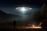 UFO Beaming up outdoors nature night. AI generated Image by rawpixel.