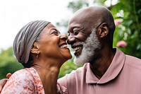 African american senior couple kissing laughing adult happy. AI generated Image by rawpixel.