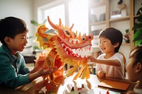 Celebration Chinese New Year with family child dragon play. AI generated Image by rawpixel.