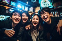 Mixed race asian friends having fun on night out celebration laughing adult. AI generated Image by rawpixel.