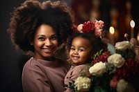 Afro american family holiday candle flower. AI generated Image by rawpixel.