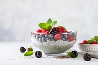 Chia pudding blackberry blueberry fruit. AI generated Image by rawpixel.