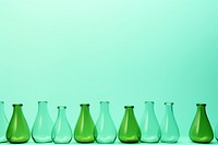 Green glass vase arrangement. AI generated Image by rawpixel.