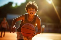 A Latino athlete practicing basketball at an outdoor school court sports outdoors sunlight. AI generated Image by rawpixel.