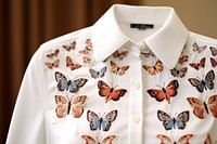 Embroided butterfly pattern blouse insect shirt. AI generated Image by rawpixel.