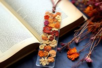 Dried flower bookmark publication plant leaf. AI generated Image by rawpixel.