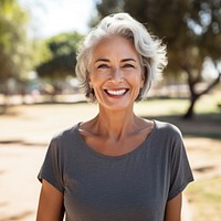 Happy senior woman laughing portrait smiling. AI generated Image by rawpixel.