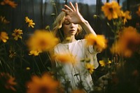 A woman and flowers photography portrait plant. AI generated Image by rawpixel.