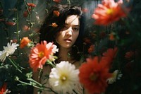 A woman and flowers photography portrait outdoors. AI generated Image by rawpixel.
