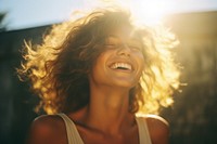 A woman smile to the sun light laughing motion adult. AI generated Image by rawpixel.
