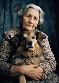 A puppy with an old woman photography portrait mammal. 