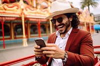 Latino try to selfie with smartphone laughing travel adult. AI generated Image by rawpixel.