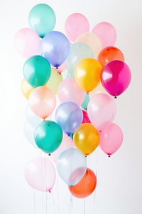 Colorful balloons free floating against a clear white background joy anniversary celebration. AI generated Image by rawpixel.