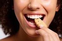 Girl biting eating food. AI generated Image by rawpixel.