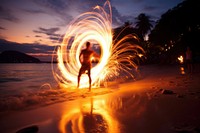 Single man doing fireshow at the beach in thailand light photography outdoors. AI generated Image by rawpixel.