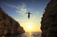 Cliff diving adventure outdoors nature. 