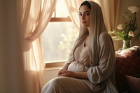 Middle eastern woman sitting person female. AI generated Image by rawpixel.