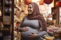 Moroccan pregnant woman shopping portrait person. AI generated Image by rawpixel.