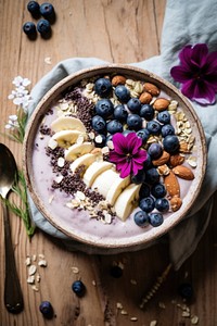 Acai bowl blueberry granola table. AI generated Image by rawpixel.