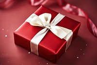 White ribbon with bow on red box gift celebration anniversary. AI generated Image by rawpixel.