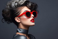 A glamorous female model sunglasses lipstick portrait. 