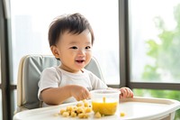 Eat baby food relaxation innocence happiness. AI generated Image by rawpixel.