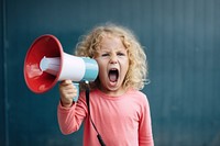 Kid screaming to megaphone shouting electronics happiness. AI generated Image by rawpixel.