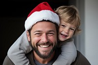 Boy riding the neck dad in chistmas day laughing portrait adult. AI generated Image by rawpixel.