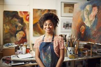 African American student wearing apron painting on a painting art individuality entrepreneur. AI generated Image by rawpixel.