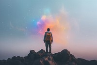 A backpack standing on top of a rock outdoors nature galaxy. AI generated Image by rawpixel.