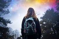 A woman with a backpack looking up into the sky outdoors walking nature. AI generated Image by rawpixel.