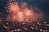 Fireworks light up the night sky over a city architecture cityscape outdoors. AI generated Image by rawpixel.