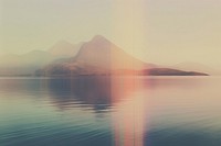 A lake with a mountain in the background landscape outdoors nature. AI generated Image by rawpixel.
