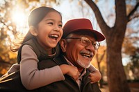Hispanic family grandfather laughing portrait. AI generated Image by rawpixel.