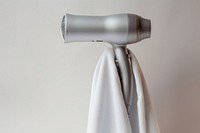 A hair dryer white binoculars technology. AI generated Image by rawpixel.
