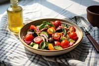 Mediterranean salad plate table food meal. AI generated Image by rawpixel.