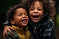 Black sibling kids hugging and laugh laughing baby rain. 