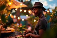 Barbeque outdoors adult food. AI generated Image by rawpixel.