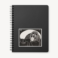 Black spiral notebook flat lay