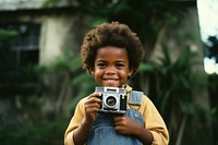 A little black kid photography portrait camera. 